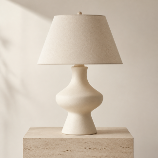 Cream ceramic desk lamp on a wooden surface